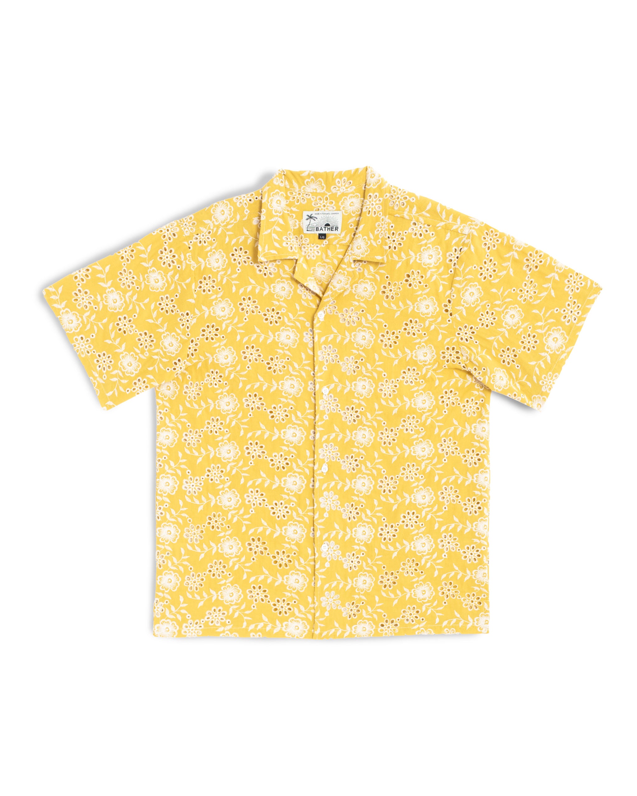 Yellow camp shirt with an embroidered floral pattern