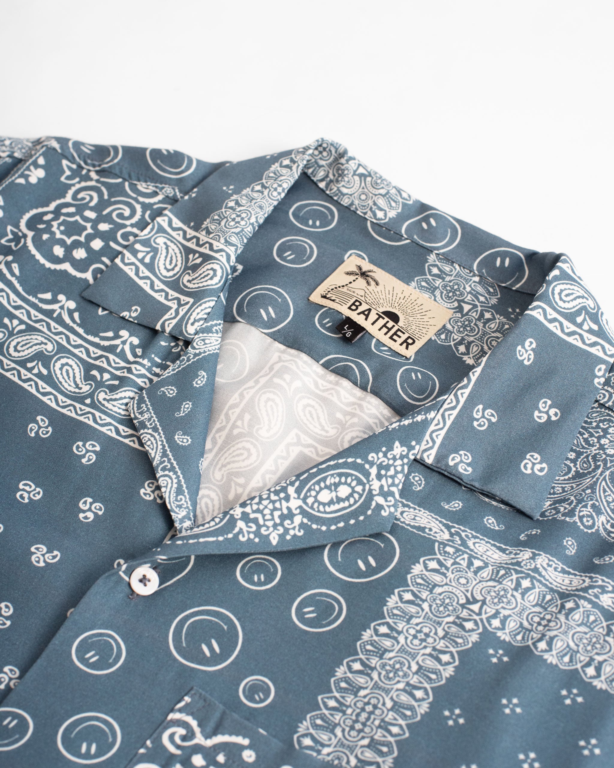 Collar close up Blue camp shirt with all-over bandana print