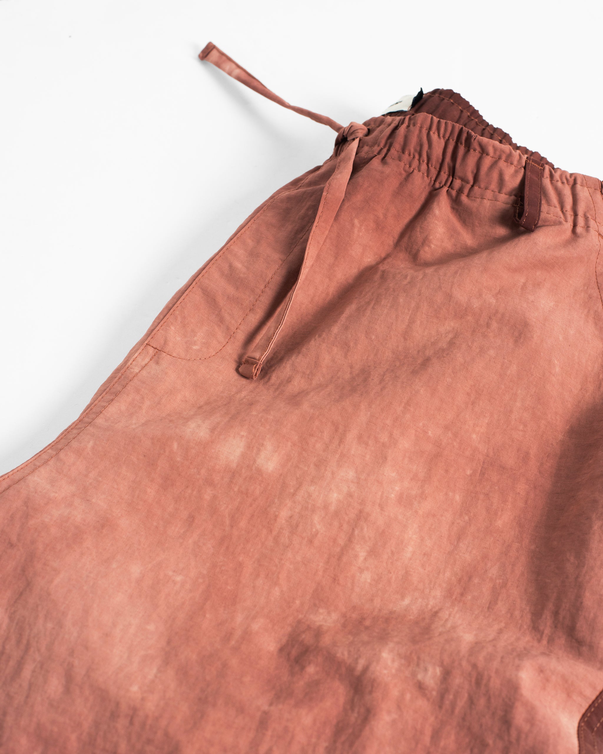 Bather red wave dyed leisure pant detail shot on white background