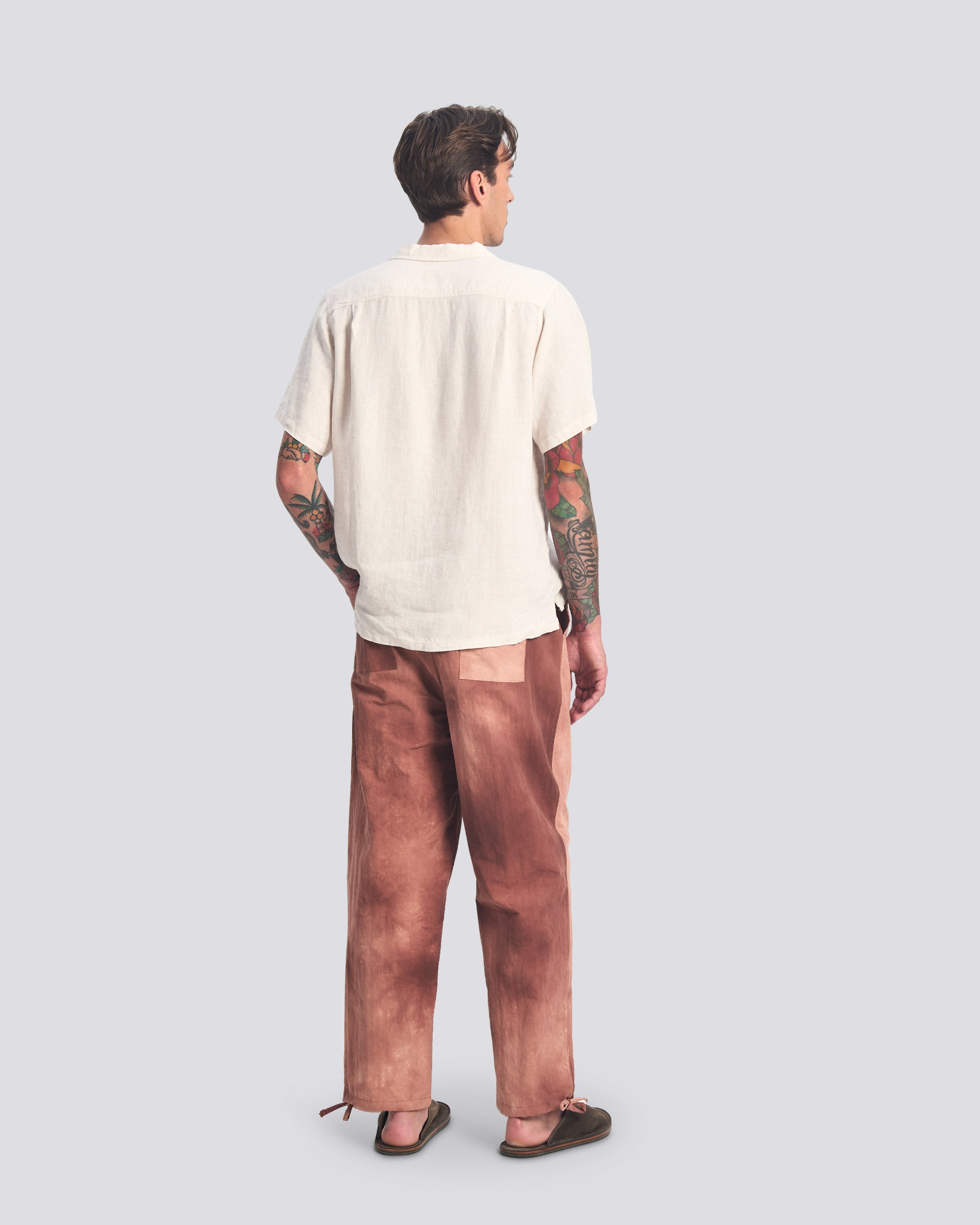 Bather red wave dyed leisure pant on white background worn by model
