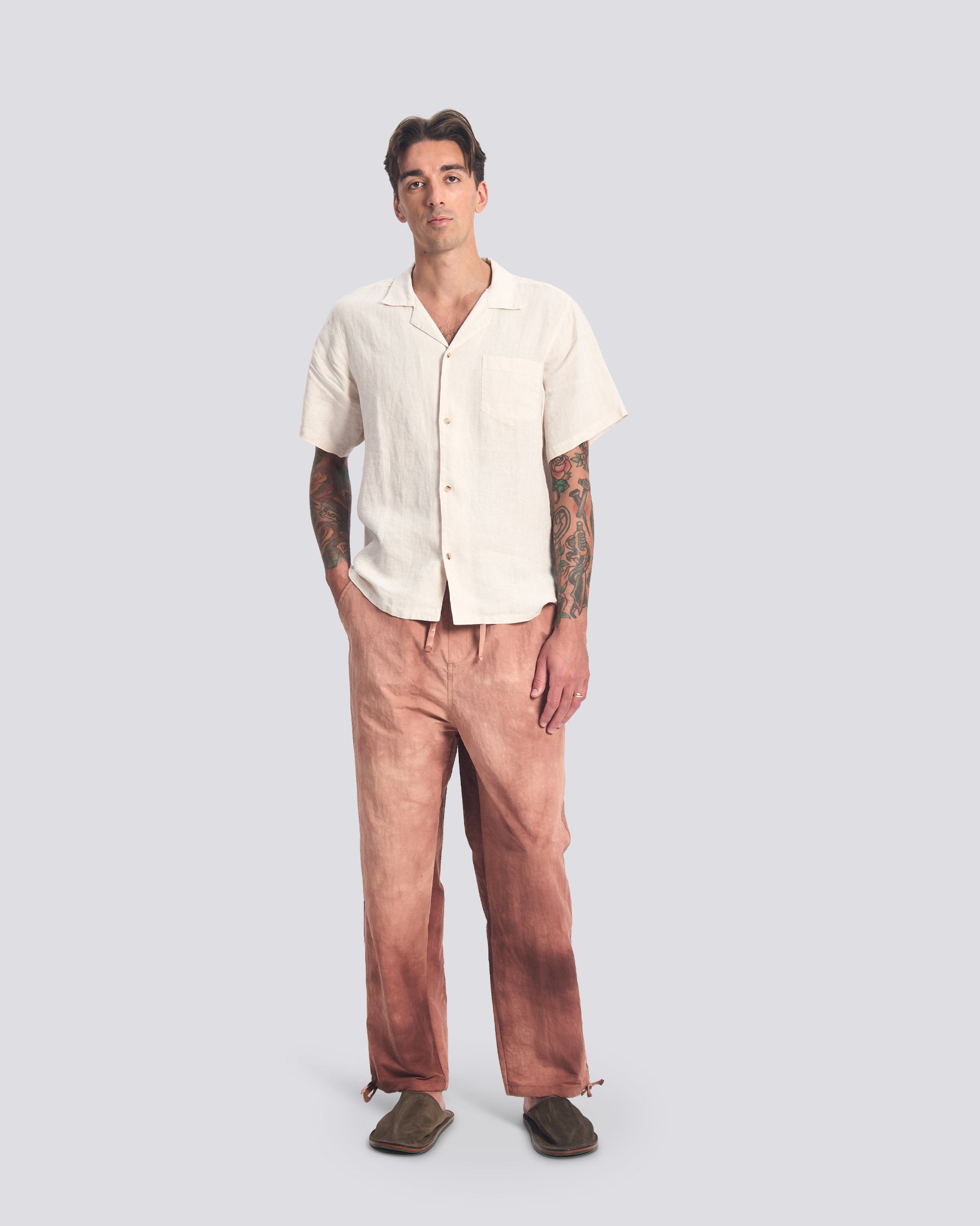 Bather red wave dyed leisure pant on white background worn by model