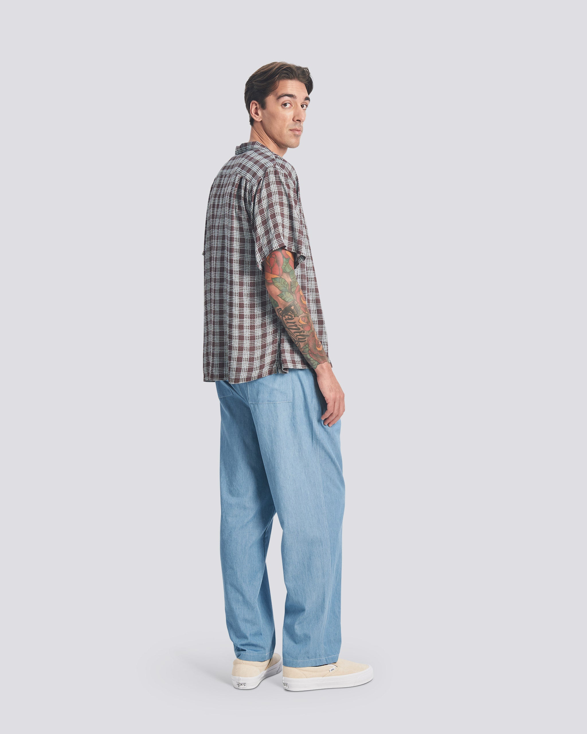 Bather mens light blue denim leisure pant worn by model on white background