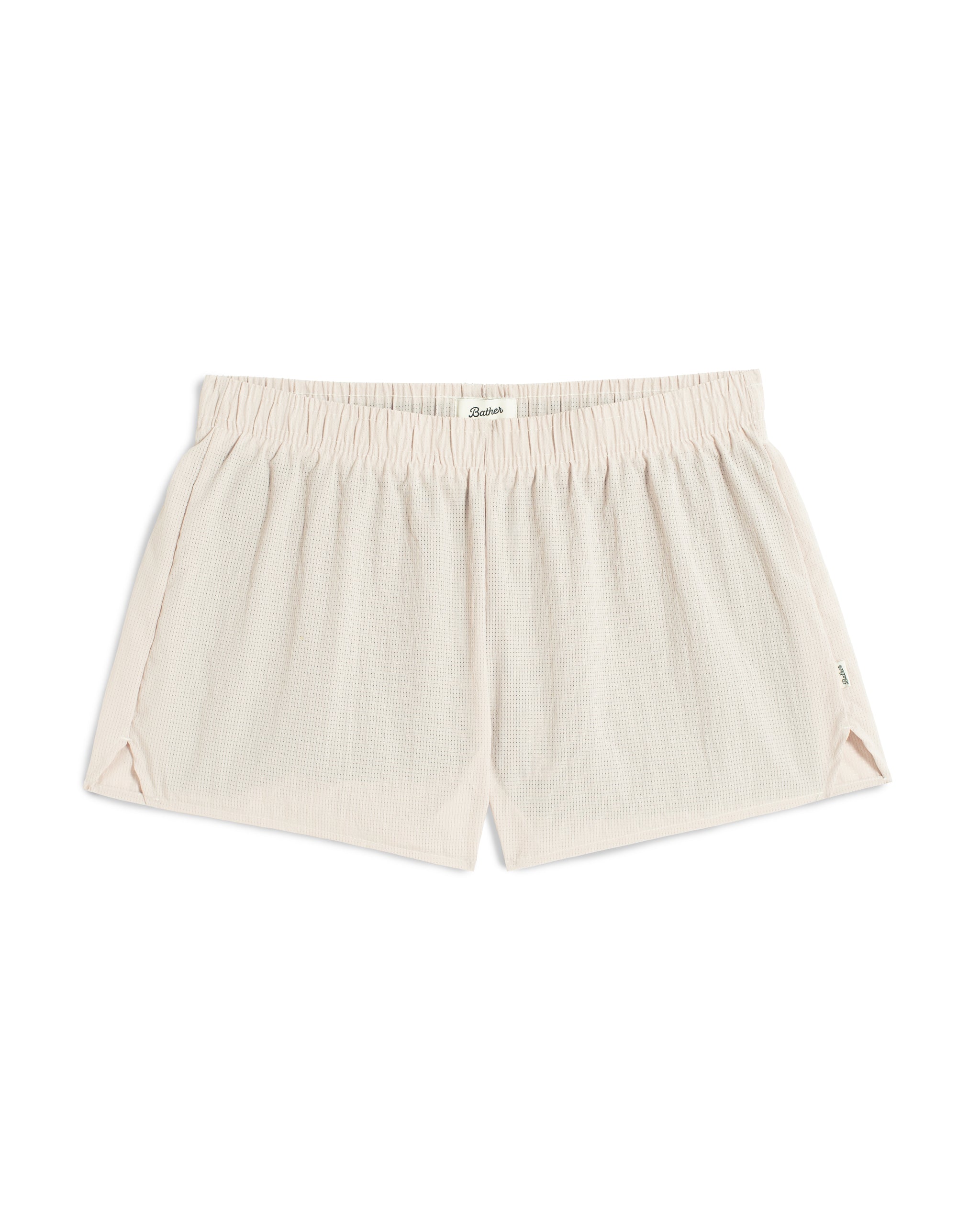 Front view of 3.5 inch inseam Bather Active Trunk in white featuring lightweight recycled Japanese DotAir nylon with stretch fabric and compression liner