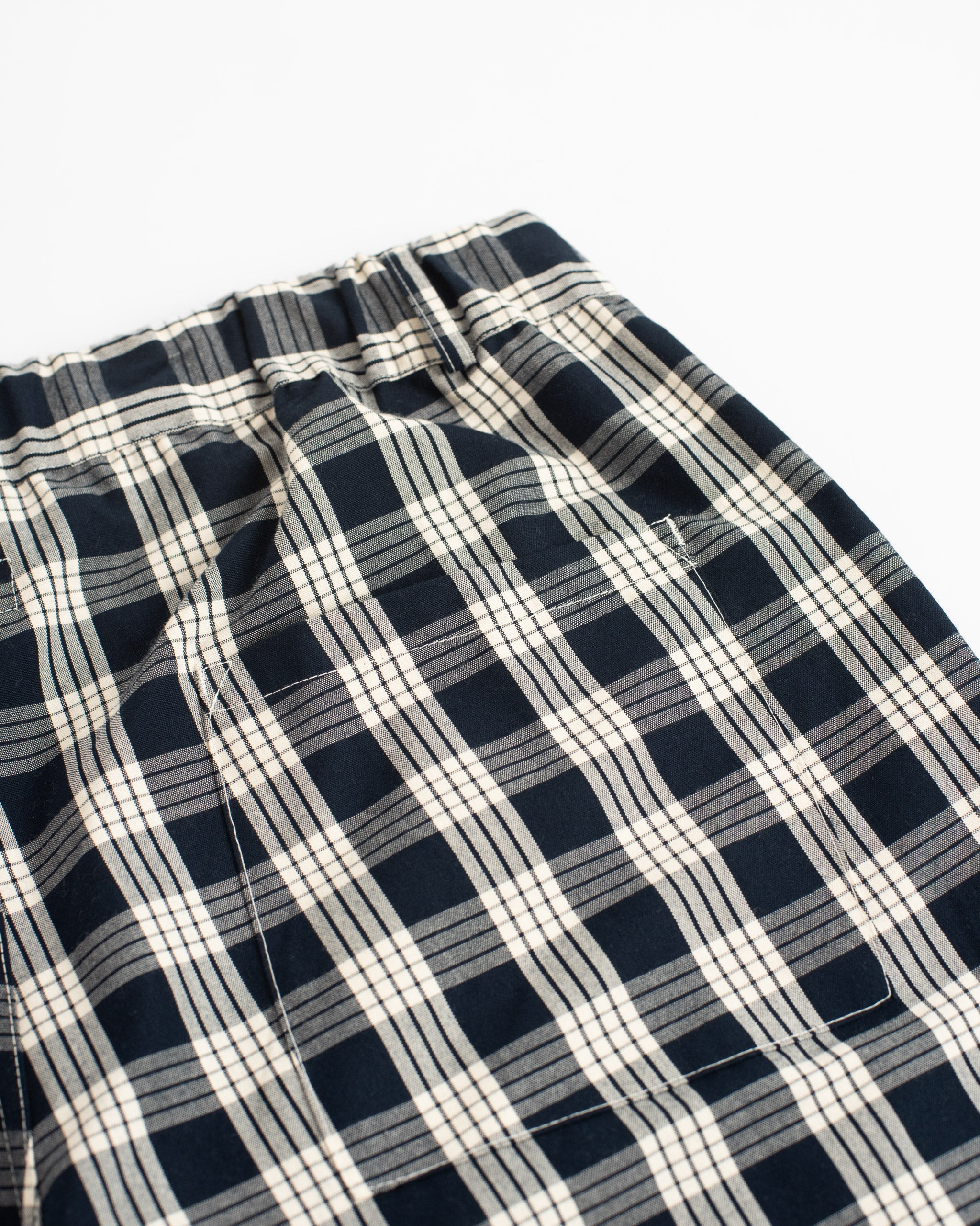 Back pocket detail on Bather men's black check short