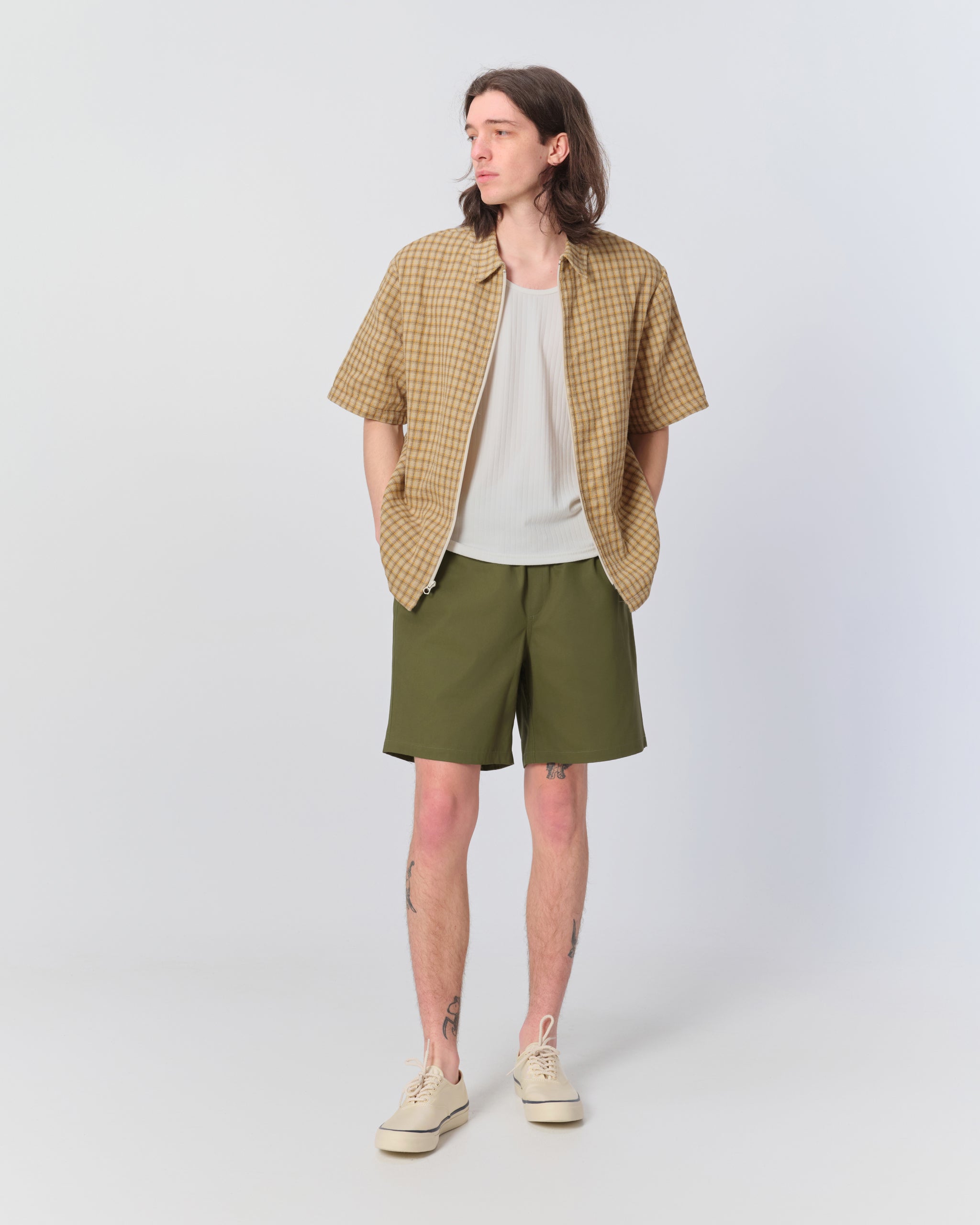 Model wearing Bather men's olive green drawstring shorts
