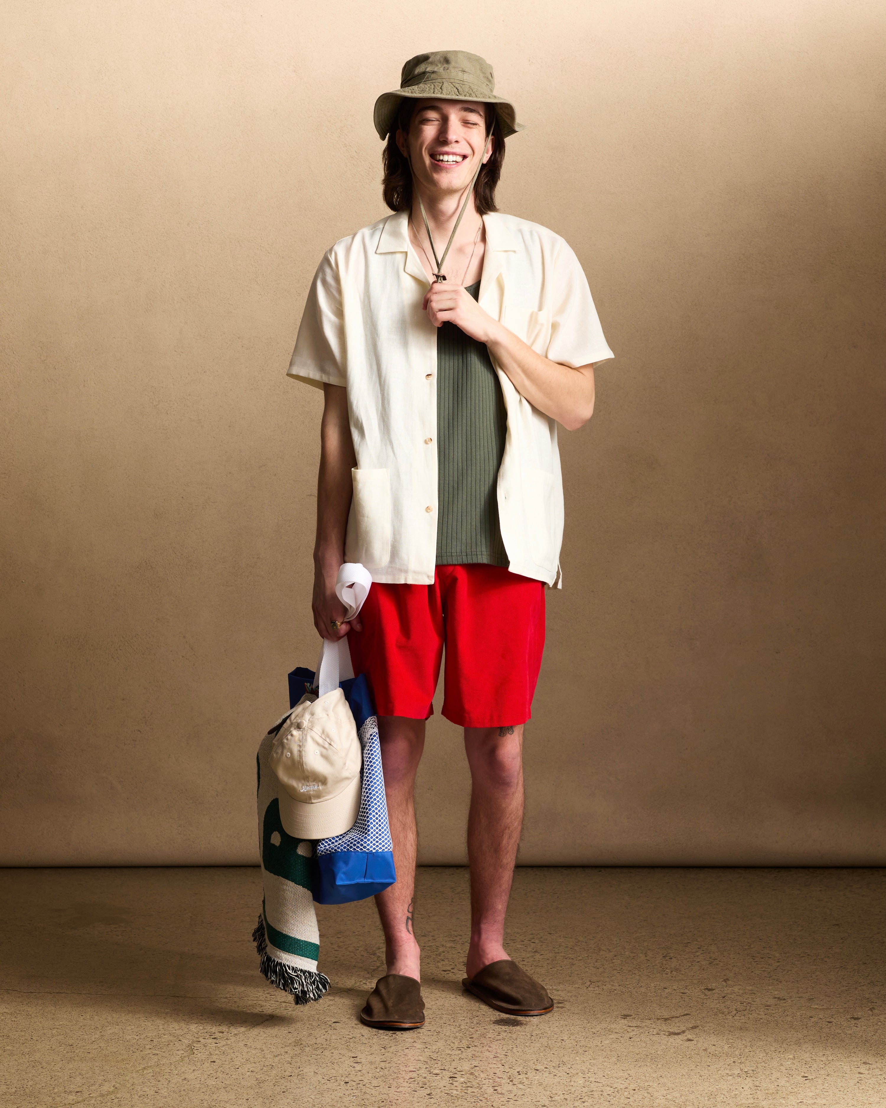 Model wearing Bather men's red corduroy short
