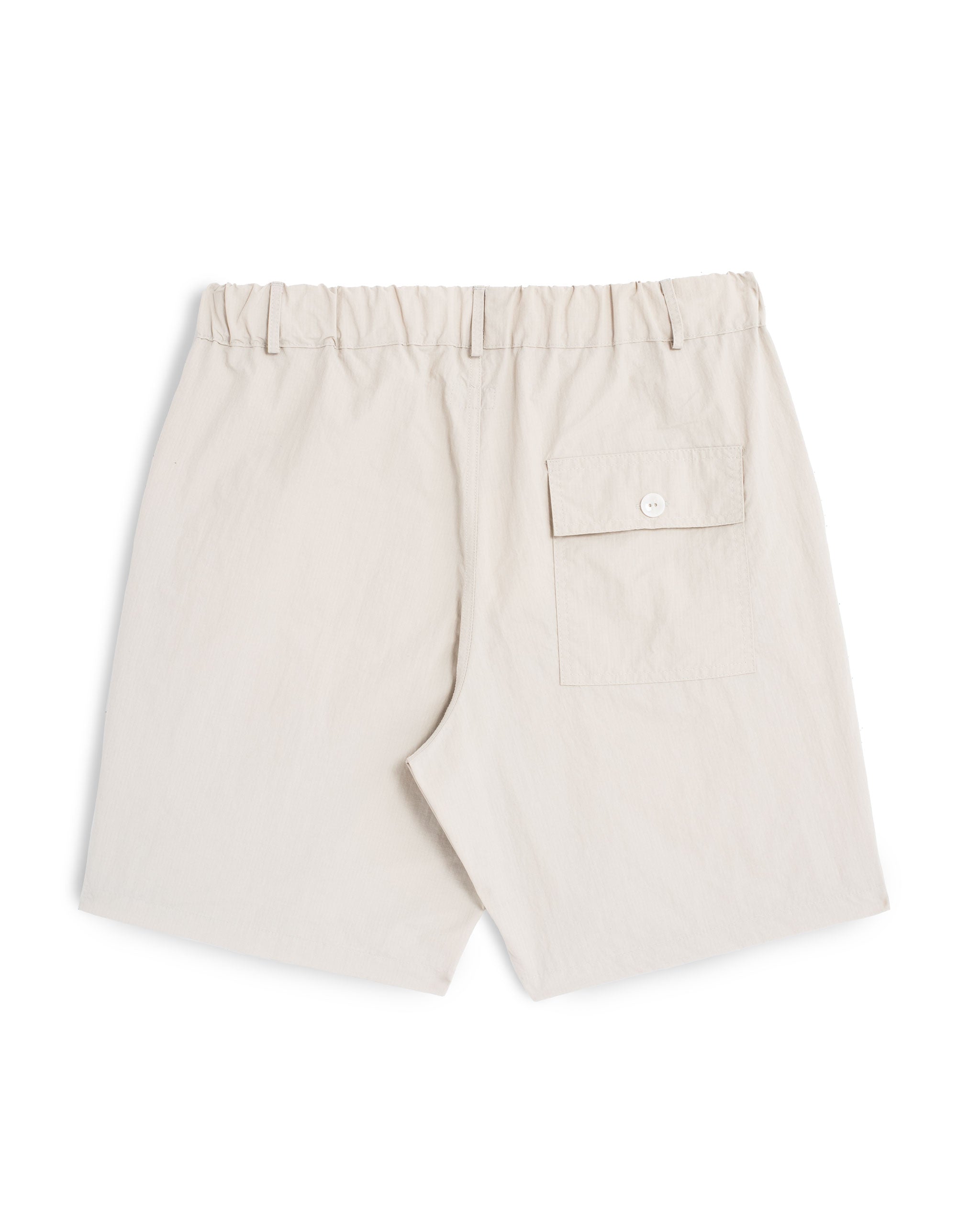 Back shot of bone coloured utility shorts in 100% Japanese nylon