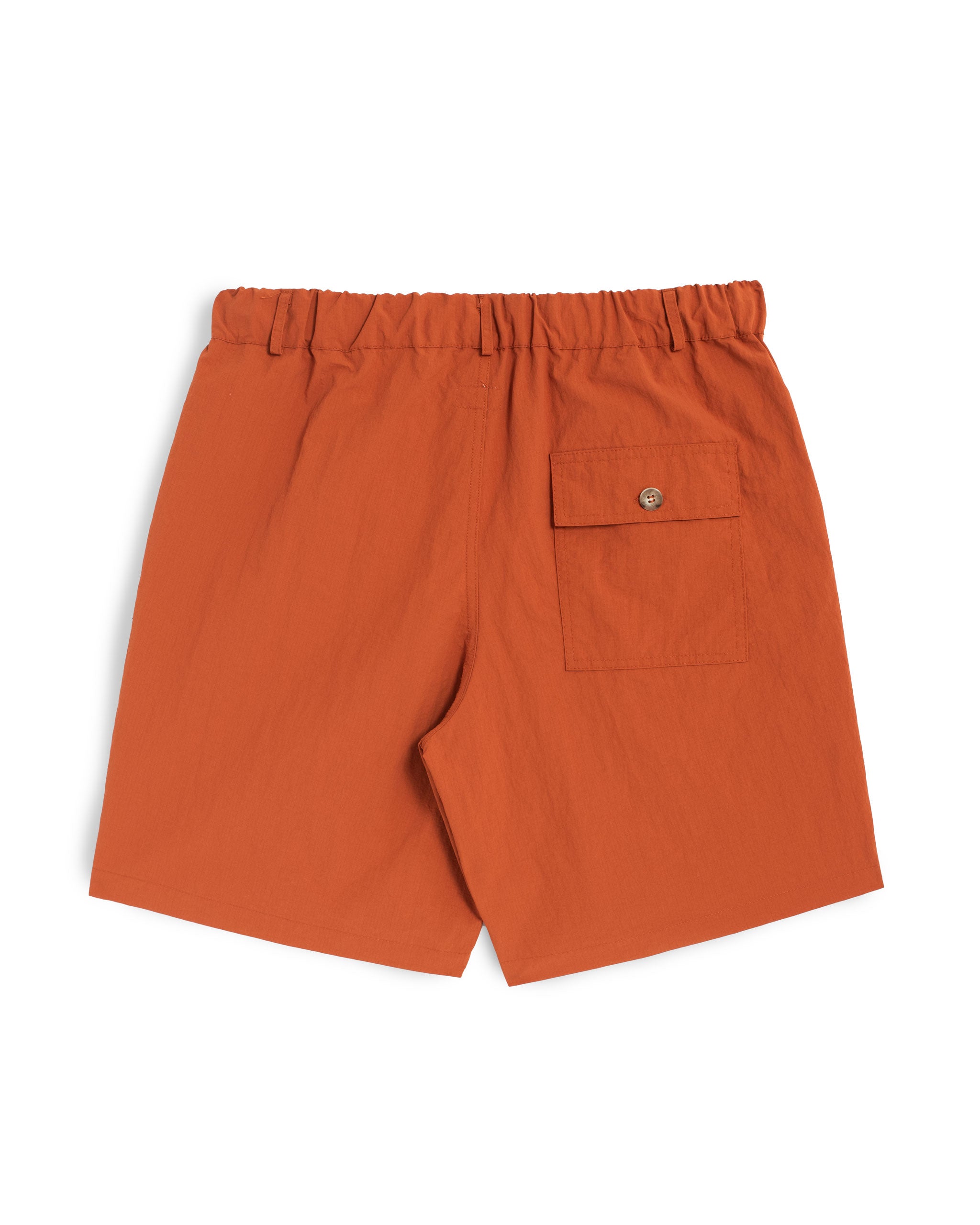 Back shot of Solid Orange nylon utility shorts with pocket on right side