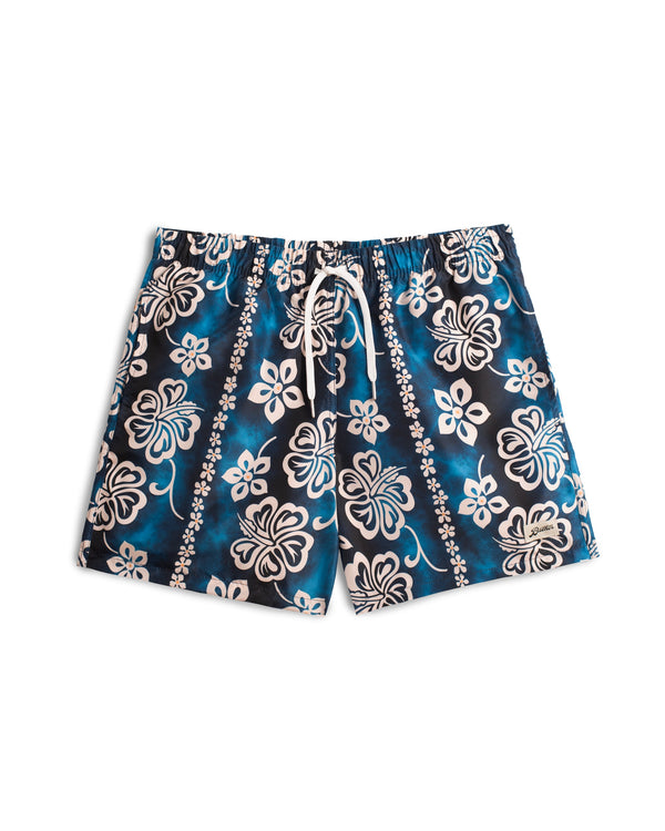 Blue Bather swim trunk with a tropical pattern and beige floral motif
