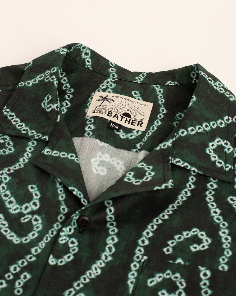 Chemise de camp verte à crochets et boucles