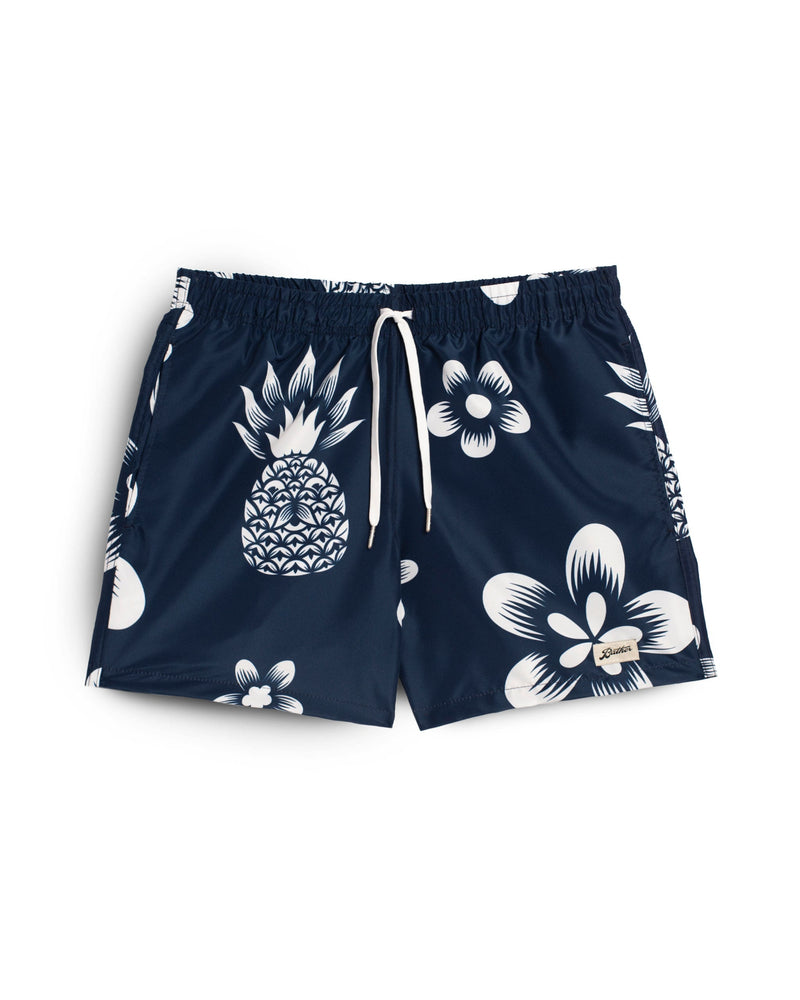 navy Bather swim trunk with white pineapple and floral pattern